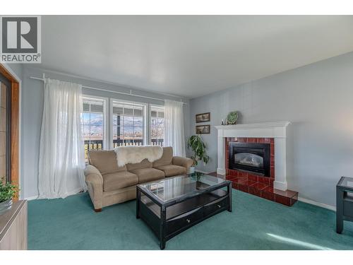 445 Road 5, Oliver, BC - Indoor Photo Showing Living Room With Fireplace