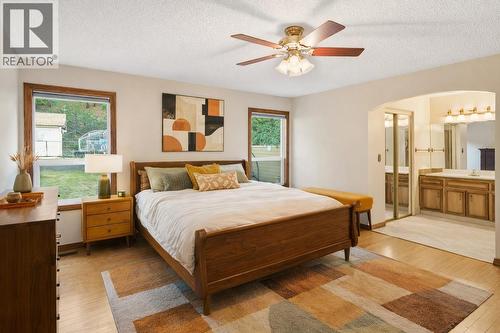 *virtually staged for illustrative purposes - 1099 Dehart Road, Kelowna, BC - Indoor Photo Showing Bedroom