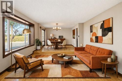 *virtually staged for illustrative purposes - 1099 Dehart Road, Kelowna, BC - Indoor Photo Showing Living Room