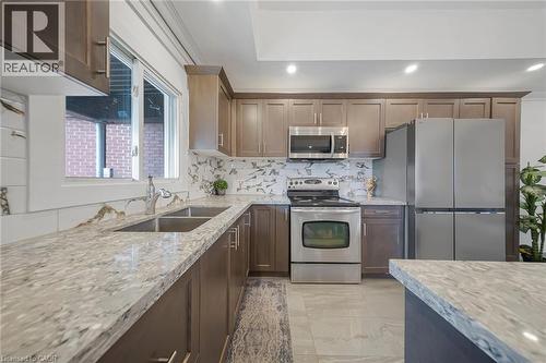 118 Cope Street, Hamilton, ON - Indoor Photo Showing Kitchen With Double Sink