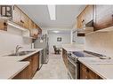 1035 Bernard Avenue Unit# 104, Kelowna, BC  - Indoor Photo Showing Kitchen With Double Sink 