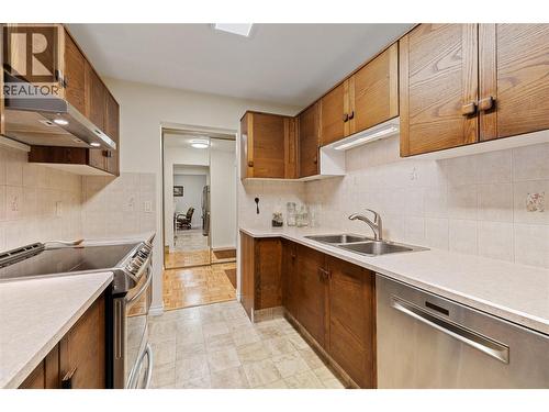 1035 Bernard Avenue Unit# 104, Kelowna, BC - Indoor Photo Showing Kitchen With Double Sink