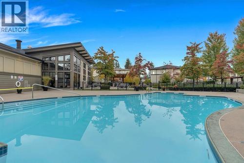 2307 3093 Windsor Gate, Coquitlam, BC - Outdoor With In Ground Pool With Backyard