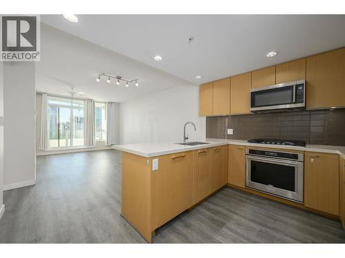 2307 3093 Windsor Gate, Coquitlam, BC - Indoor Photo Showing Kitchen With Double Sink