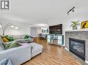 606 98 Tenth Street, New Westminster, BC  - Indoor Photo Showing Living Room With Fireplace 