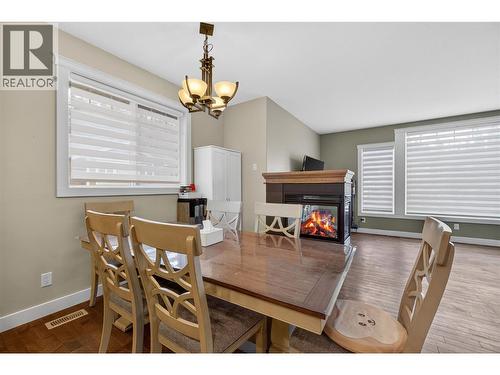 1581 20 Street Ne Unit# 36, Salmon Arm, BC - Indoor Photo Showing Dining Room With Fireplace