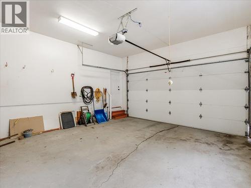 Double Car Garage - 702 Munro Street, Nelson, BC - Indoor Photo Showing Garage