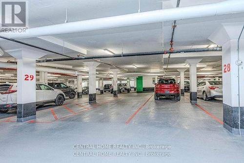 1405 - 75 Oneida Crescent, Richmond Hill, ON - Indoor Photo Showing Garage
