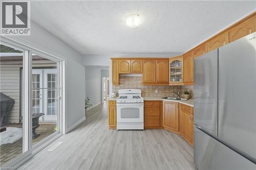 1412 Mcdowell Road E, Simcoe, ON - Indoor Photo Showing Kitchen With Double Sink