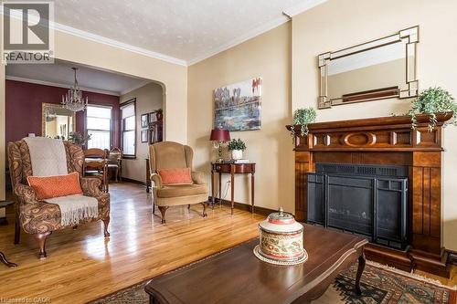167 Park Street N, Hamilton, ON - Indoor Photo Showing Living Room With Fireplace
