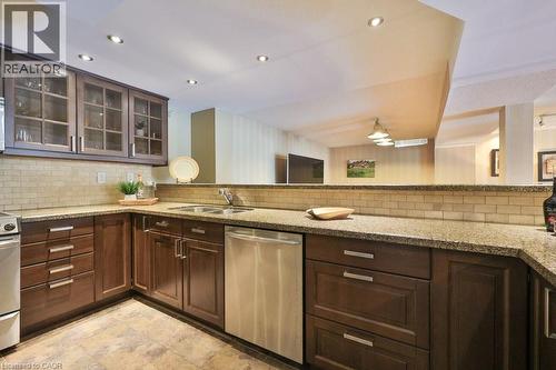 Breakfast Bar, Stainless Steel Appliances - 1658 Covington Terrace, Mississauga, ON - Indoor Photo Showing Kitchen With Double Sink