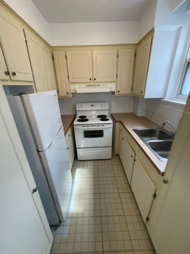 Cuisine - 204-4921 Av. Clanranald, Montréal (Côte-Des-Neiges/Notre-Dame-De-Grâce), QC - Indoor Photo Showing Kitchen With Double Sink
