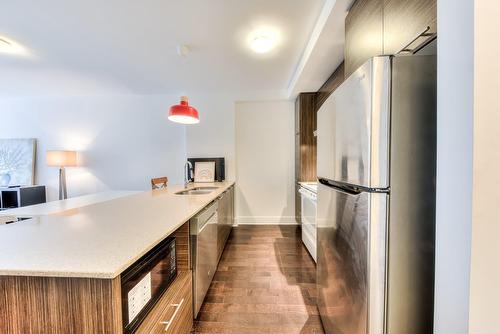 Cuisine - 102-2285 Av. Ekers, Mont-Royal, QC - Indoor Photo Showing Kitchen With Double Sink