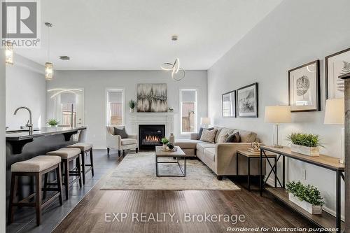 Virtually staged Living room with fireplace - 89 Sonoma Valley Crescent, Hamilton, ON - Indoor Photo Showing Living Room With Fireplace