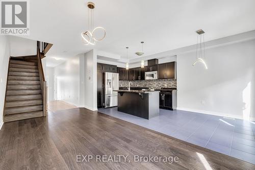 Kitchen with a breakfast bar area, open floor plan - 89 Sonoma Valley Crescent, Hamilton, ON - Indoor Photo Showing Kitchen With Upgraded Kitchen