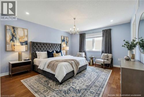 Virtually Staged Main Bedroom with dark wood-style floors and a chandelier - 89 Sonoma Valley Crescent, Hamilton, ON - Indoor Photo Showing Bedroom