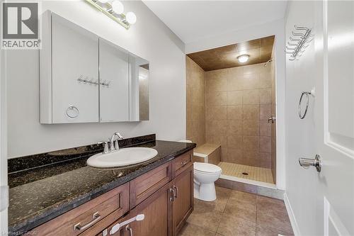 Bathroom featuring vanity, a shower stall, and light tile patterned flooring - 89 Sonoma Valley Crescent, Hamilton, ON - Indoor Photo Showing Bathroom