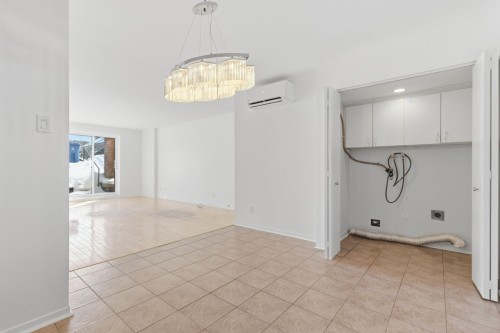 Salle de lavage - 1-3095 Rue Arthur-Houle, Longueuil (Saint-Hubert), QC - Indoor Photo Showing Other Room