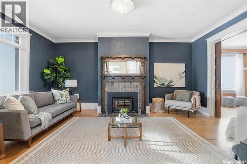 702 Queen Street, Saskatoon, SK - Indoor Photo Showing Living Room With Fireplace
