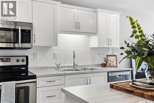 2105 104 Willis Crescent, Saskatoon, SK - Indoor Photo Showing Kitchen With Double Sink With Upgraded Kitchen