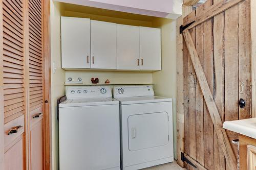 Salle de bains - 10075 Boul. Lévesque E., Laval (Saint-François), QC - Indoor Photo Showing Laundry Room