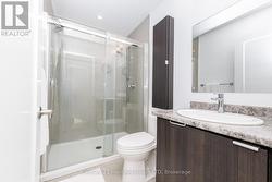 Ensuite has walk-in shower with dual shower heads - 