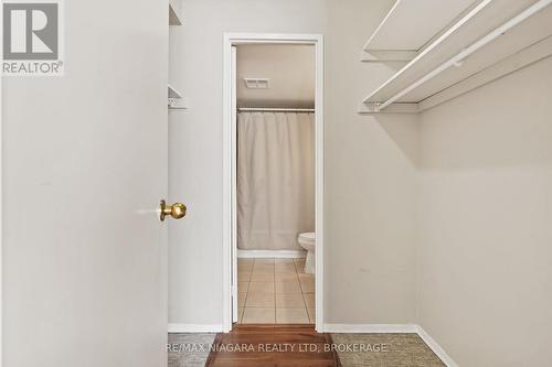 Walk in closet in primary suite. - 502 - 7 Gale Crescent, St. Catharines (E. Chester), ON - Indoor With Storage