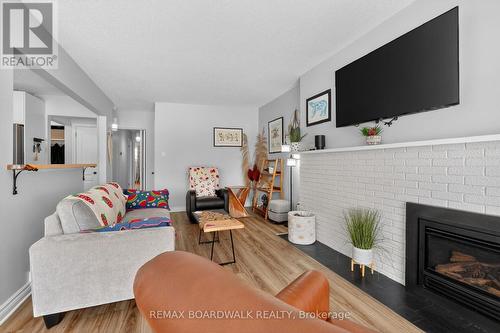 2462 Tupper Avenue, Ottawa, ON - Indoor Photo Showing Living Room With Fireplace