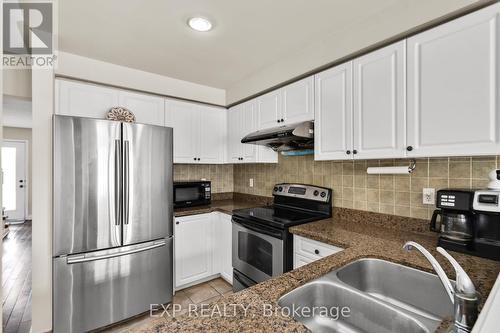 9039 Yonge Street, Richmond Hill, ON - Indoor Photo Showing Kitchen With Stainless Steel Kitchen With Double Sink