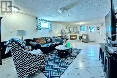 92 Skelton Boulevard, Brampton, ON - Indoor Photo Showing Living Room With Fireplace