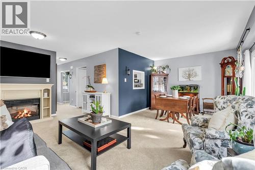 99 Lynden Circle, Georgetown, ON - Indoor Photo Showing Living Room With Fireplace