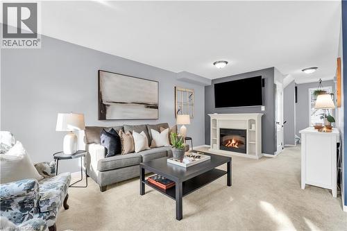 99 Lynden Circle, Georgetown, ON - Indoor Photo Showing Living Room With Fireplace
