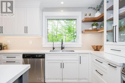 8 Malta Crescent, Springwater, ON - Indoor Photo Showing Kitchen With Double Sink