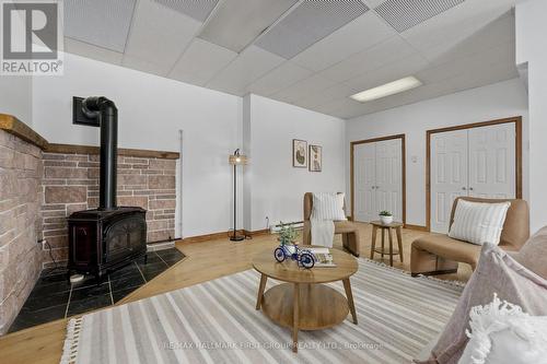 110 Davis Road, Alnwick/Haldimand, ON - Indoor Photo Showing Living Room With Fireplace