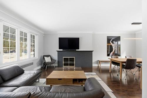 Salon - 72 Av. Simcoe, Mont-Royal, QC - Indoor Photo Showing Living Room With Fireplace