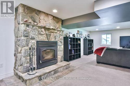 28 Nicholson Crescent, Springwater, ON - Indoor With Fireplace