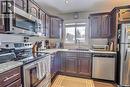 122 Macarthur Drive, Prince Albert, SK  - Indoor Photo Showing Kitchen With Double Sink 