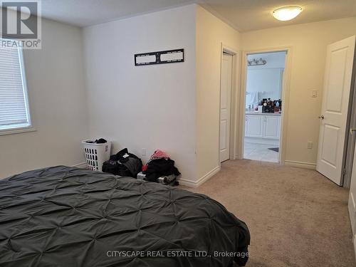 Primary Bedroom + Walk In Closet + 4pc Ensuite - 351 Ridley Crescent, Southgate, ON - Indoor Photo Showing Bedroom