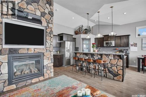 426 Lyle Crescent, Warman, SK - Indoor Photo Showing Other Room With Fireplace