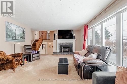 219 Pescod Avenue, Cornwall, ON - Indoor Photo Showing Living Room With Fireplace
