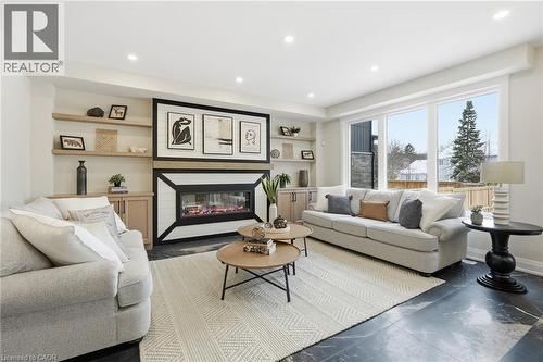 7 Bartlett Avenue, Grimsby, ON - Indoor Photo Showing Living Room With Fireplace