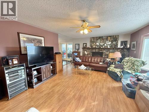 4793 S 97 Highway, Quesnel, BC - Indoor Photo Showing Living Room With Fireplace