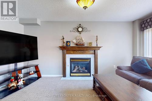 48 Patrick Drive S, Barrie, ON - Indoor Photo Showing Living Room With Fireplace