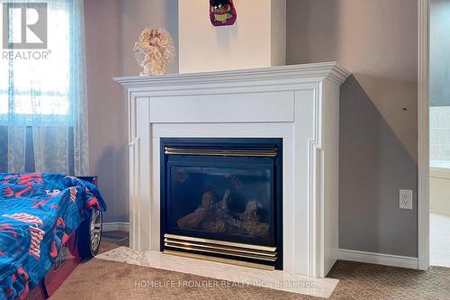 48 Patrick Drive S, Barrie, ON - Indoor Photo Showing Living Room With Fireplace