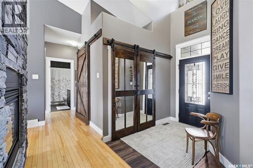 307 Brookside Drive, Warman, SK - Indoor Photo Showing Other Room With Fireplace