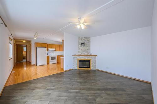 103 Sandale Drive, Winnipeg, MB - Indoor Photo Showing Living Room With Fireplace