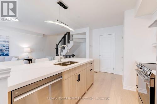 628 Garibaldi Common, Burlington, ON - Indoor Photo Showing Kitchen With Double Sink