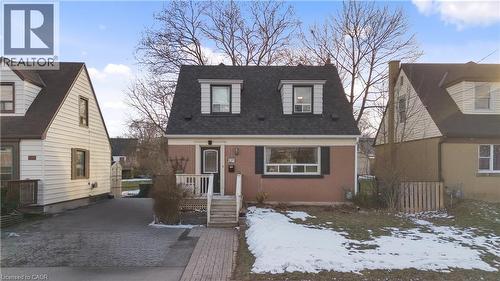 View of front facade featuring brick siding and a shingled roof - 776 Britannia Avenue, Hamilton, ON - Outdoor