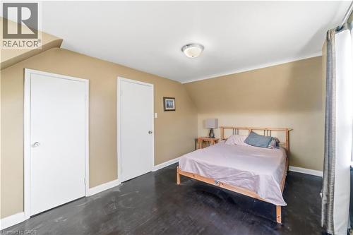 Bedroom with baseboards and wood finished floors - 776 Britannia Avenue, Hamilton, ON - Indoor Photo Showing Bedroom