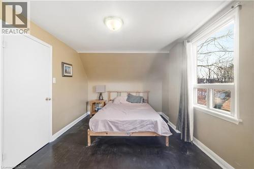 Bedroom with wood finished floors and vaulted ceiling - 776 Britannia Avenue, Hamilton, ON - Indoor Photo Showing Bedroom